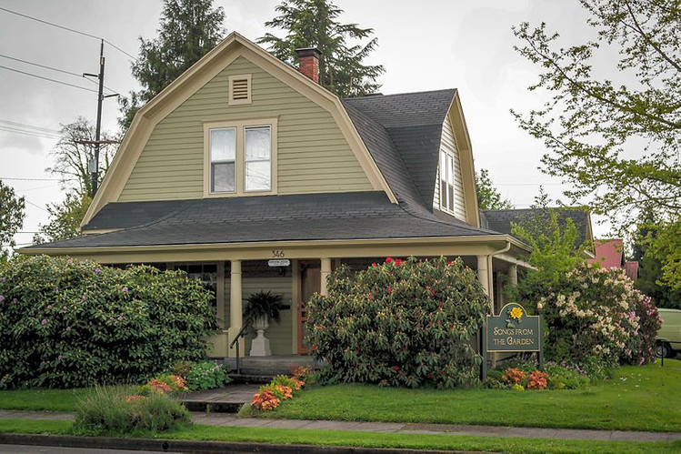 Cottage with Sage Lap Siding