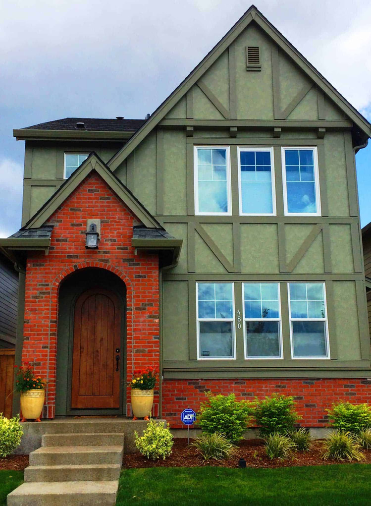 Modern Tudor with Olive Green “Half-Timbers”