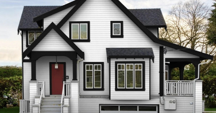 Beautiful Cottage with White Lap Siding and Black Trim
